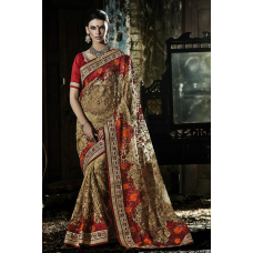 Rattling Beige Colored Woolen Embroidered Net Saree